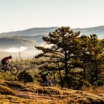 Brandon and Evan ride mountain bikes in Dupont State Forest near Brevard, NC.
